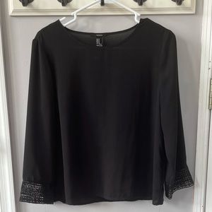 black blouse with sleeve detail